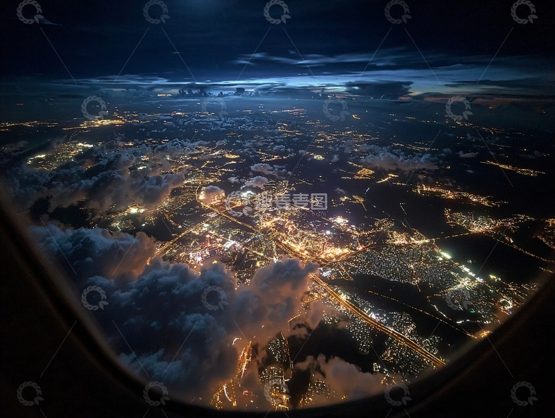 高清大图下载【趣麦麦图】夜空中飞机窗口俯瞰灯火辉煌的城市景观