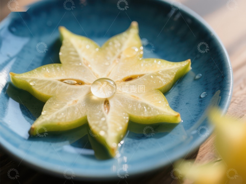 高清大图下载【趣麦麦图】切片杨桃置于蓝色盘中
