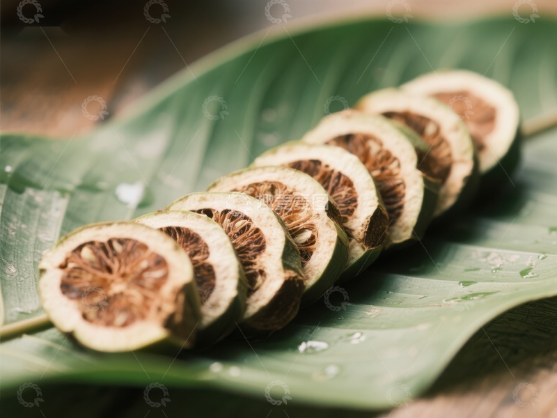 高清大图下载【趣麦麦图】柠檬片置于绿叶之上