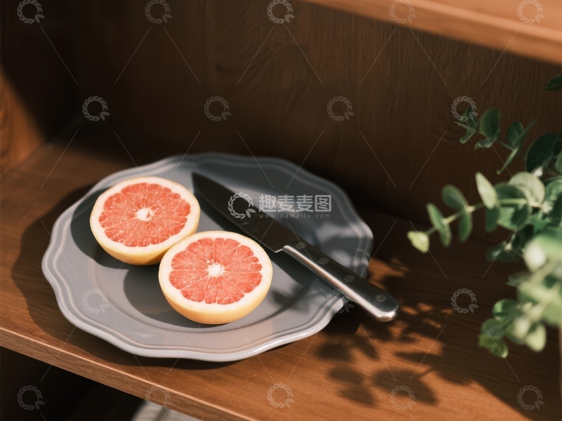 高清大图下载【趣麦麦图】切开的柚子放在盘子上，旁边有刀