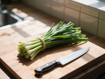 厨房案板上的青葱与刀具
