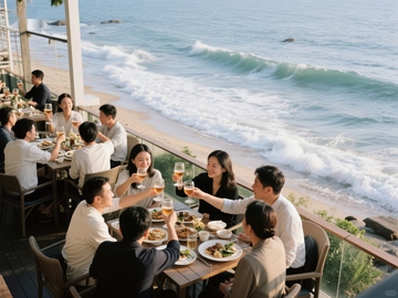 海边餐厅聚餐，众人举杯欢庆
