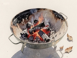 燃烧的木炭在金属锅中