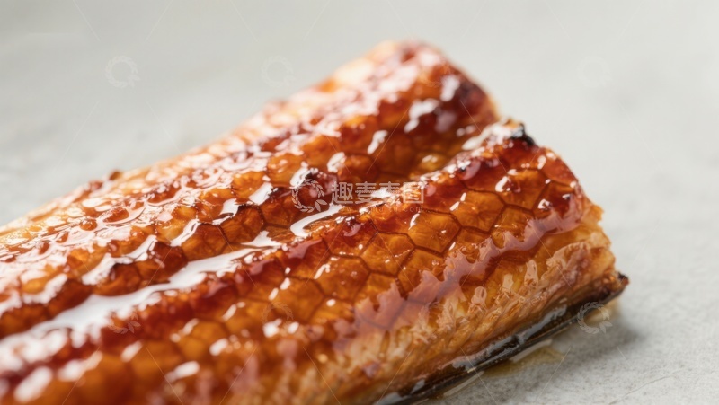 烤鳗鱼特写，酱汁光泽诱人
