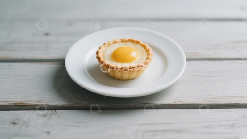 高清大图下载【趣麦麦图】-蛋挞特写：金黄蛋液与酥皮的完美结合