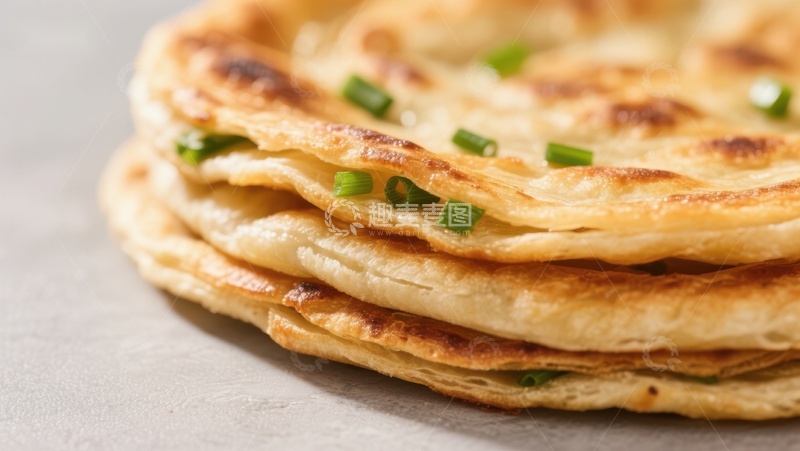 高清大图下载【趣麦麦图】金黄葱香煎饼叠放特写