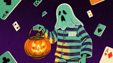 鬼魂装扮的孩子手提南瓜灯