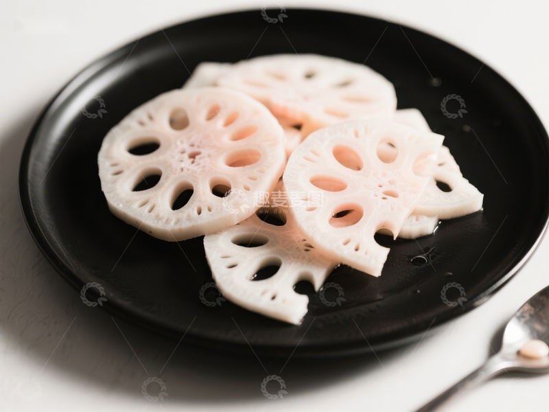 高清大图下载【趣麦麦图】莲藕切片置于黑色盘中