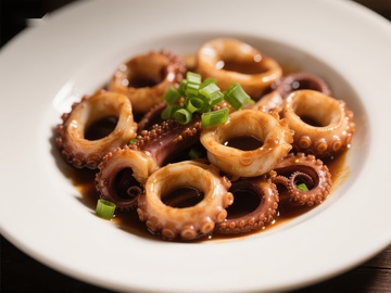 酱汁鱿鱼圈配青葱点缀