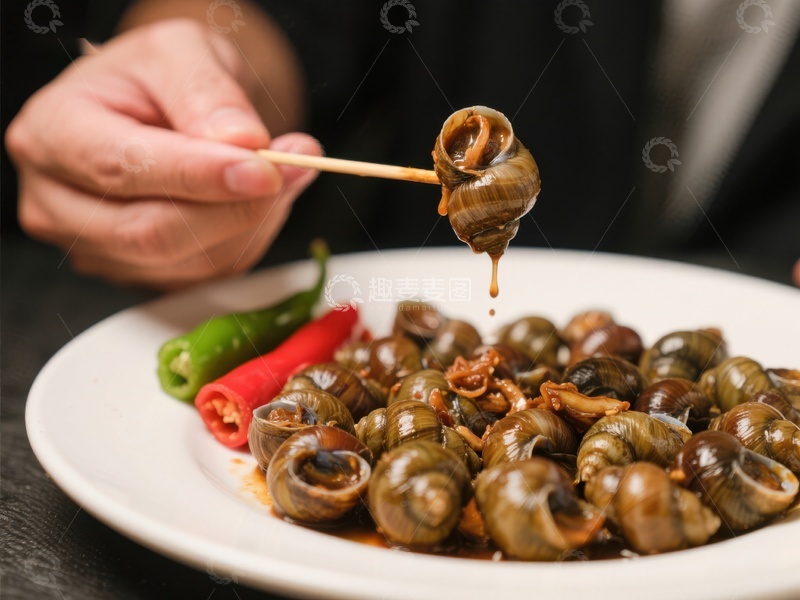 高清大图下载【趣麦麦图】美味田螺，筷子夹起特写