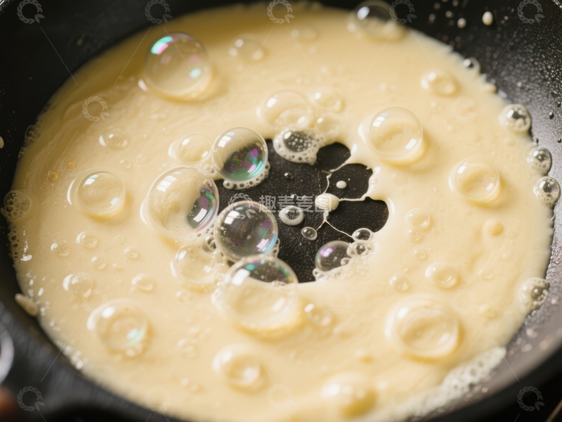 高清大图下载【趣麦麦图】煎锅中的气泡煎饼