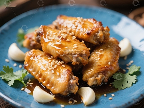美味烤鸡翅配芝麻和大蒜