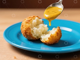 金黄酥脆的土豆球配芥末酱